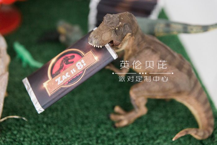 Dinosaur Devouring a Chocolate Bar from a Jurassic Park Dinosaur Birthday Party via Kara