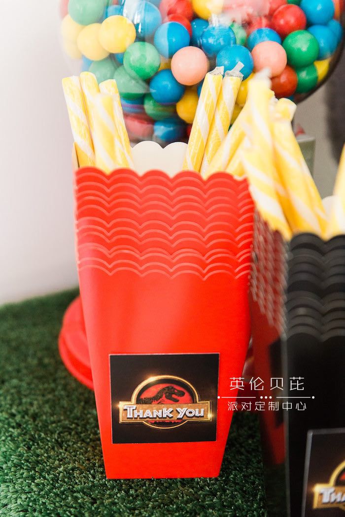 Candy Sticks + Favor Boxes from a Jurassic Park Dinosaur Birthday Party via Kara