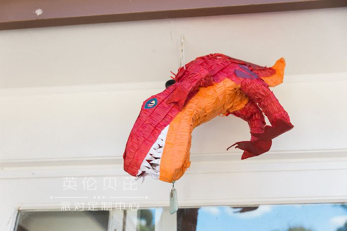 T-Rex Piñata from a Jurassic Park Dinosaur Birthday Party via Kara