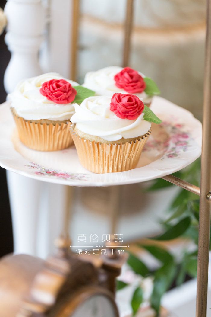 Enchanted Rose Cupcakes from a Beauty and the Beast Inspired Wedding on Kara