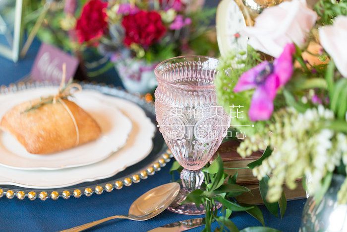 Pink crystal glass from a Beauty and the Beast Inspired Wedding on Kara