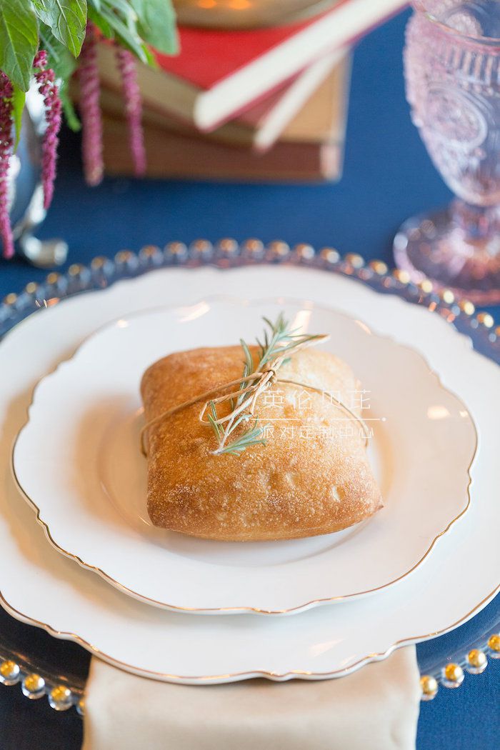 Place setting from a Beauty and the Beast Inspired Wedding on Kara